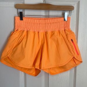 Lululemon tracker short bright orange 4”